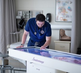PA student using Anatomage table in PA lab